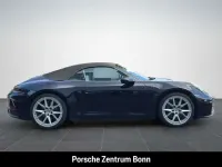 Gebraucht Porsche 911 Carrera Cabriolet 394 PS (289 kW) 2025 Tiefschwarzmetallic Cabrio