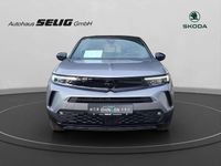 Gebraucht Opel Mokka 131 PS (96 kW) 2025 Silbermetallic SUV