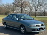 Gebraucht Mitsubishi Carisma 103 PS (75 kW) 2003 Grün Limousine