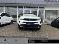 Gebraucht Opel Mokka-e Ultimate 100 kW (136 PS) 2024 Jade weiss/arktis weiss SUV