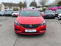 Używany Opel Astra Selection 101 KM (74 kW) 2017 Czerwony Sedan/Limuzyna