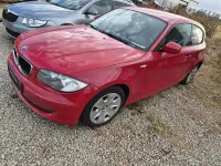 Gebraucht BMW 116 122 PS (89 kW) 2010 Rot Kleinwagen