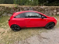 Gebraucht Opel Corsa 101 PS (74 kW) 2010 Rot Kleinwagen