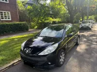 Gebraucht Peugeot 206+ 73 PS (53 kW) 2011 Schwarz Kleinwagen