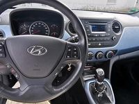 Gebraucht Hyundai i10 67 PS (49 kW) 2015 Weiß Kleinwagen