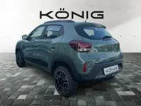 Gebraucht Dacia Spring Extreme 47 kW (65 PS) 2023 Grün "flechtengrau" Kleinwagen
