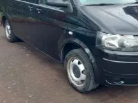 Używany VW Caravelle 179 KM (131 kW) 2012 Czarny Van