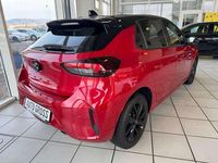 Gebraucht Opel Corsa 101 PS (74 kW) 2024 Lackierung peperoncino red/typ (metallic) Kleinwagen