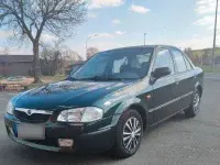 Usata Mazda 323 88 CV (64 kW) 1998 Verde Berlina