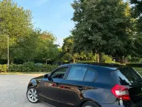 Gebraucht BMW 118 123 PS (90 kW) 2006 Schwarz Kleinwagen