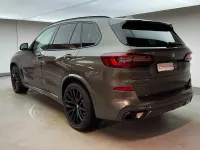Gebraucht BMW X5 Comfort Edition 340 PS (250 kW) 2023 Manhattan metallic SUV