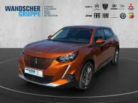 Gebraucht Peugeot e-2008 Active 100 kW (136 PS) 2021 Orange SUV