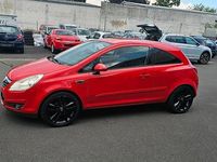 Gebraucht Opel Corsa 80 PS (58 kW) 2007 Magma rot (b) Kleinwagen