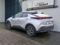 Gebraucht Toyota C-HR Team 140 PS (102 kW) 2023 Shimmering silver metallic / dach schwarz SUV