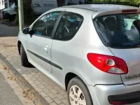 Gebraucht Peugeot 206+ 75 PS (55 kW) 2011 Silber Kleinwagen