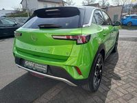 Gebraucht Opel Mokka-e Ultimate 100 kW (136 PS) 2022 Matcha grün / dach schwarz SUV