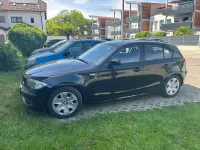 Second-hand BMW 116 122 CP (89 kW) 2008 Negru Hatchback
