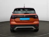 Gebraucht VW T-Cross Basis 95 PS (69 kW) 2023 Energetic orange metallic SUV