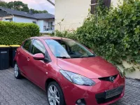 Gebraucht Mazda 2 75 PS (55 kW) 2008 Rot Kleinwagen