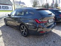 Gebraucht BMW 320e 190 PS (139 kW) 2023 Dravitgrau Kombi