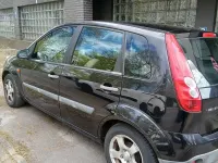 Używany Ford Fiesta 69 KM (50 kW) 2006 Niebieski Hatchback