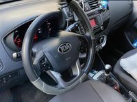 Gebraucht Kia Rio 84 PS (61 kW) 2015 Weiß Limousine