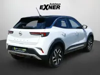 Gebraucht Opel Mokka Elegance 101 PS (74 kW) 2023 Jade weiß / dach schwarz SUV