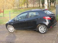 Gebraucht Mazda 2 Impuls 75 PS (55 kW) 2009 Schwarz Limousine