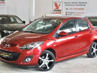 Gebraucht Mazda 2 Inclusive 95 PS (69 kW) 2013 Rot Kleinwagen