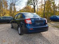 gebraucht Suzuki SX4 Lim. 1.6 Comfort*SR+LMF*WR*SZH*Klimaaut*1.H.