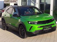 Gebraucht Opel Mokka-e GS Line 100 kW (136 PS) 2023 Matcha green/ikone gruen (metallic) SUV