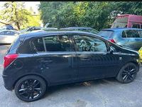 Second-hand Opel Corsa Active 100 CP (73 kW) 2014 Negru Hatchback