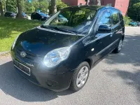 Gebraucht Kia Picanto Attract 65 PS (47 kW) 2010 Schwarz Kleinwagen