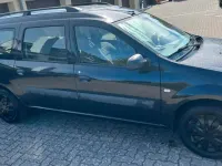 Second-hand Dacia Logan 85 CP (62 kW) 2011 Negru Break