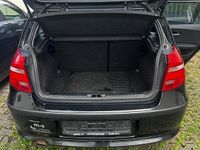 Gebraucht BMW 116 122 PS (89 kW) 2009 Schwarz Kleinwagen