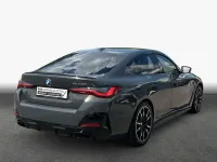 Gebraucht BMW M4 374 PS (275 kW) 2022 Dravitgrau metallic Coupé
