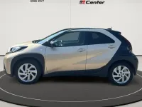 Gebraucht Toyota Aygo X Pulse 72 PS (52 kW) 2022 Ginger beige (4u9)/ black mica SUV