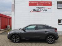 Gebraucht Citroën e-C4 Shine 100 kW (136 PS) 2023 Platinumgrau Limousine