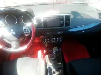 Gebraucht Mitsubishi Lancer 130 PS (95 kW) 2015 Rot Limousine