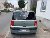 Gebraucht Peugeot 1007 Tendance 88 PS (64 kW) 2006 Grün Van / Kleinbus
