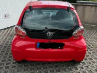 Gebraucht Toyota Aygo 68 PS (50 kW) 2013 Rot Kleinwagen