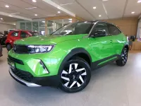 Gebraucht Opel Mokka Elegance 136 PS (100 kW) 2023 Matcha green / dach schwarz SUV