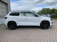 Gebraucht Skoda Karoq SportLine 150 PS (110 kW) 2019 Moonweiss metallic (metallic) SUV