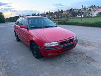 Używany Opel Astra 75 KM (55 kW) 1997 Czerwony Hatchback