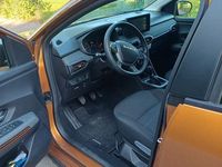 Gebraucht Dacia Sandero Expression 101 PS (74 kW) 2023 Orange Limousine