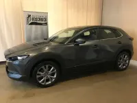 Gebraucht Mazda CX-30 Exclusive-Line 122 PS (89 kW) 2024 Machine gray SUV