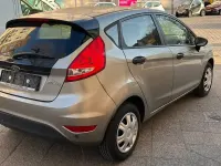Gebraucht Ford Fiesta Trend 82 PS (60 kW) 2010 Gold Limousine