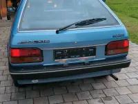 Używany Mazda 323 86 KM (63 kW) 1987 Niebieski Hatchback