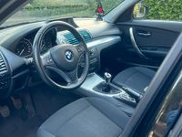 Gebraucht BMW 116 122 PS (89 kW) 2010 Schwarz Kleinwagen
