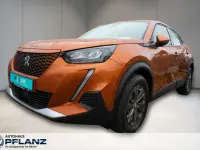 Gebraucht Peugeot e-2008 Active 100 kW (136 PS) 2022 Orange SUV